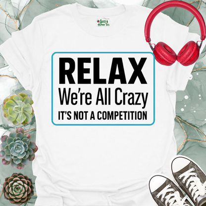 Relax we're all crazy it's not a competition Unisex Tee