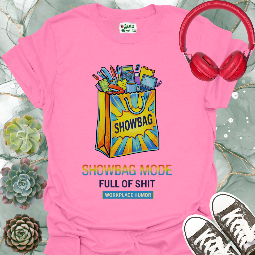 A funny workplace humor tee featuring the phrase “Showbag Mode: Full of Shit.”