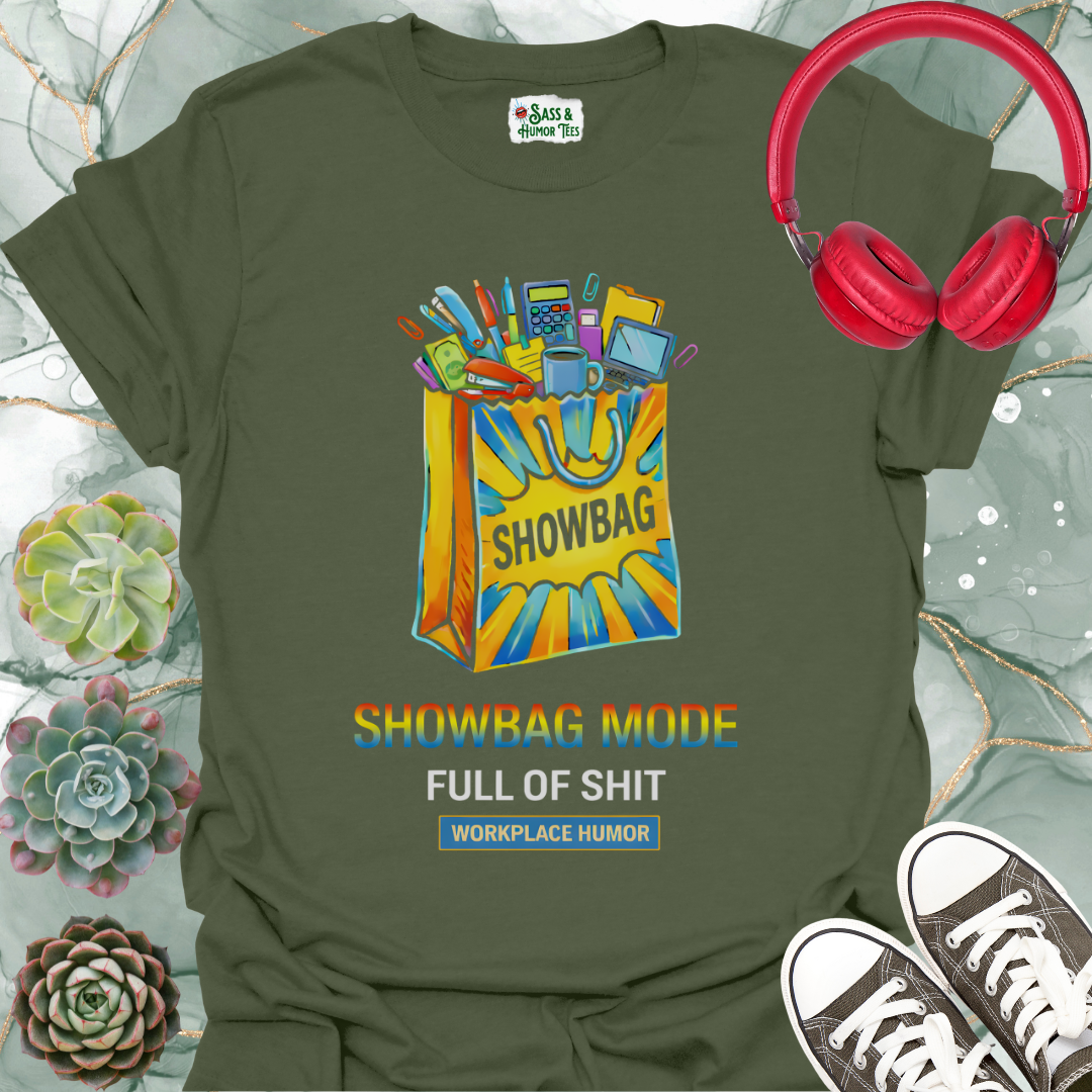A funny workplace humor tee featuring the phrase “Showbag Mode: Full of Shit.”